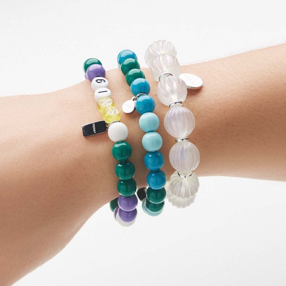 MCHM03 - Charm bracelet with your choice logo pendants