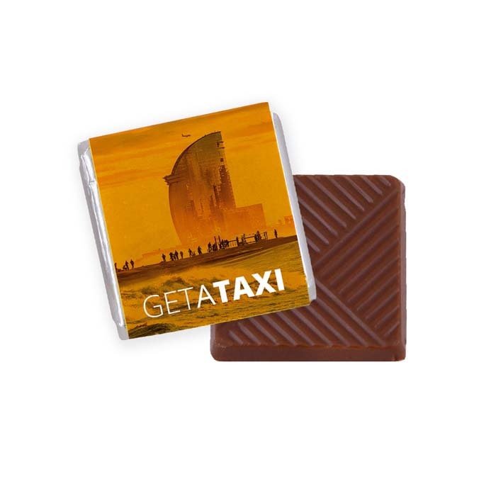 MI4001 - Belgian 5gr. piece of chocolate with your full colour design sleeve. From 2.500 pcs