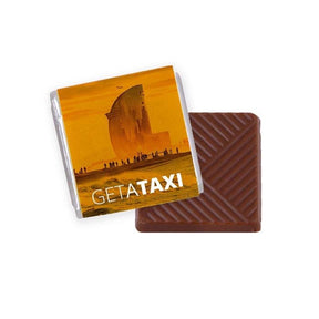 MI4001 - Belgian 5gr. piece of chocolate with your full colour design sleeve. From 2.500 pcs
